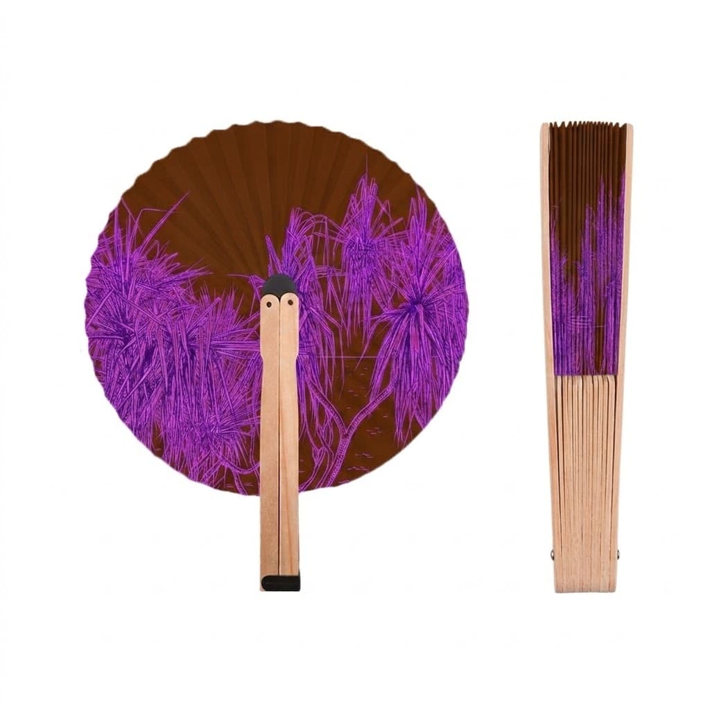 Purple pandanus palms printed on a brown fan
